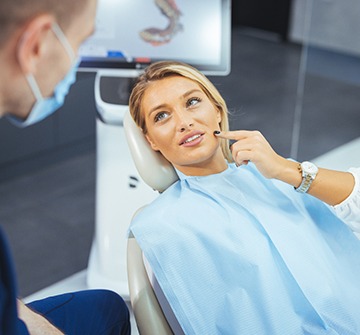 a patient visiting their dentist for an orthodontic emergency