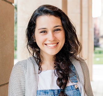 Teen girl smiling at school